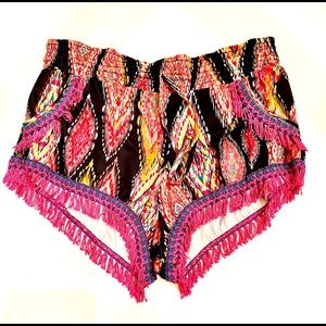 Pilyq Ikat swim short cover up with fringe.
